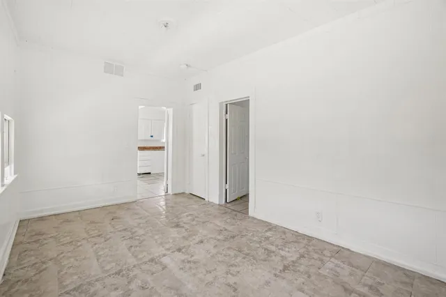 an empty room with an entryway