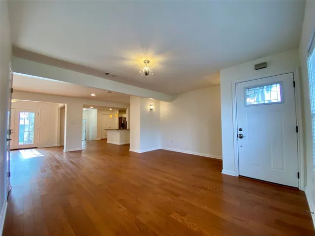 a kitchen with stainless steel appliances granite countertop a sink and cabinets