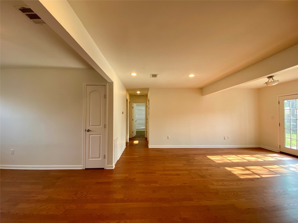 2003 Patton Lane Austin, TX 78723 - Photo 29 of 38 Living room with recessed lighting and wood finished floors