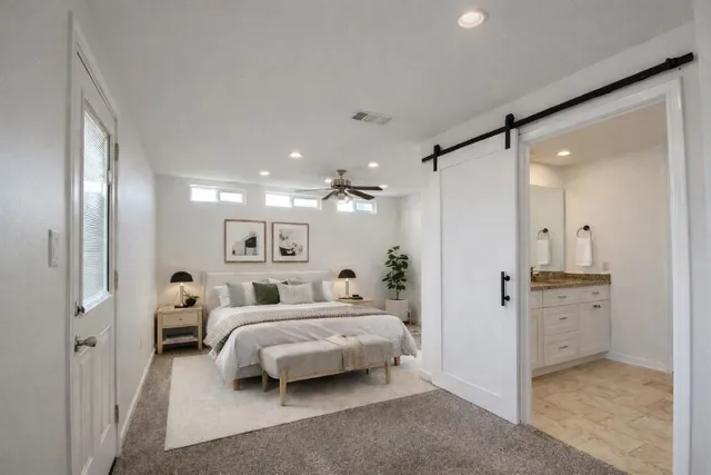 a bathroom with a bathtub and a toilet