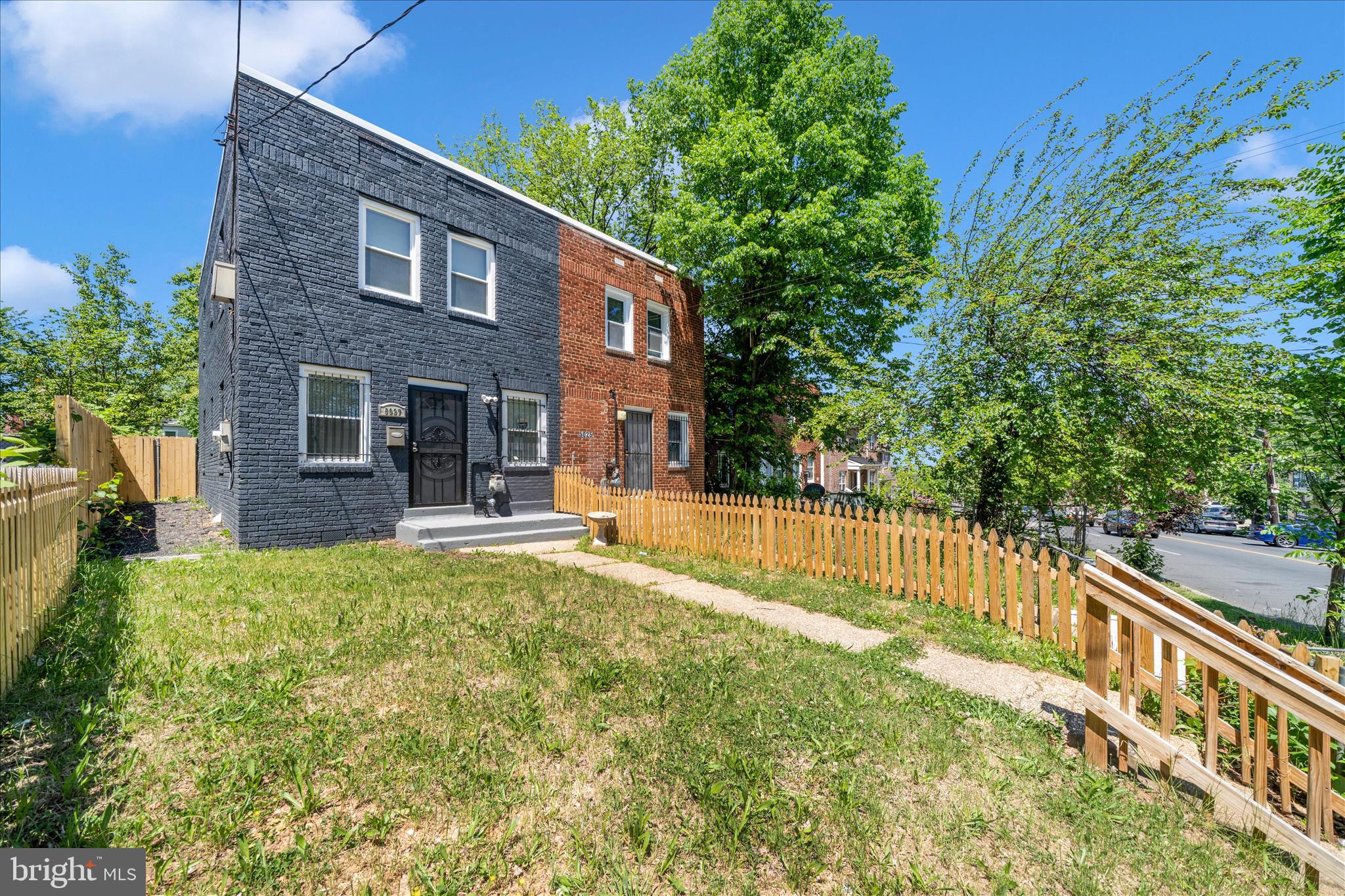 5027 Benning Road Southeast Washington, DC 20019 - Photo 4 of 57 a view of house with backyard and swimming pool