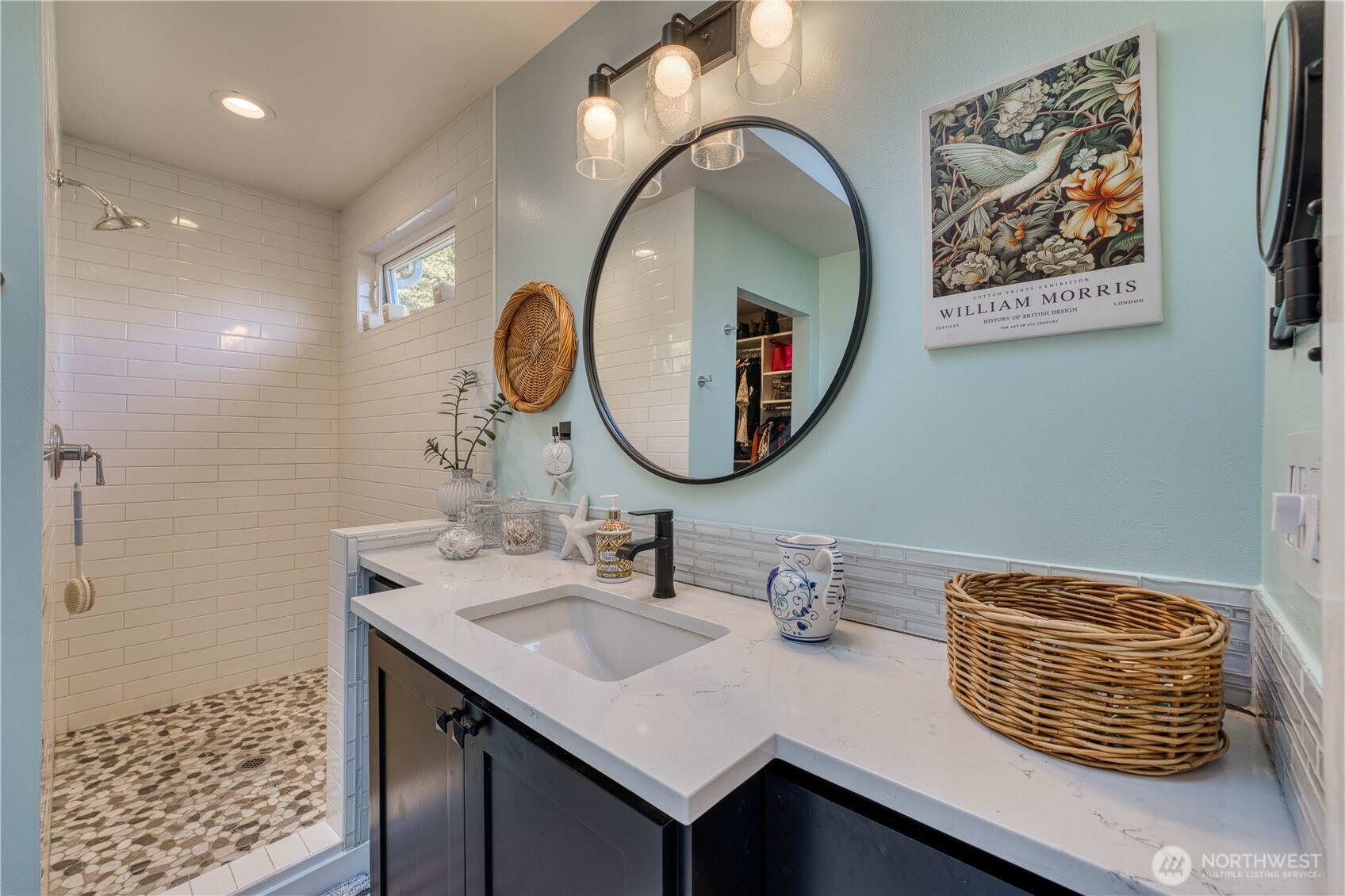 10536 Northeast 189th Street Bothell, WA 98011 - Photo 17 of 37 a bathroom with a sink and a mirror