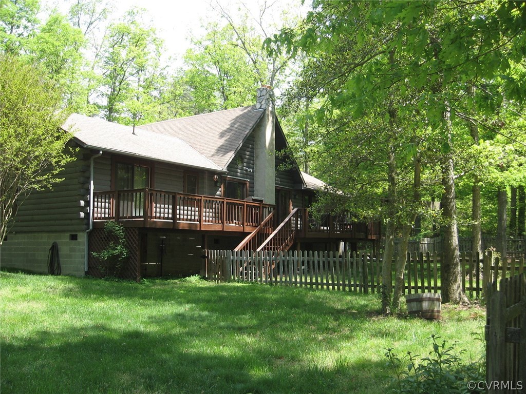 1451 Mill Road Henrico, VA 23231 - Photo 1 of 23 a view of a house with a backyard