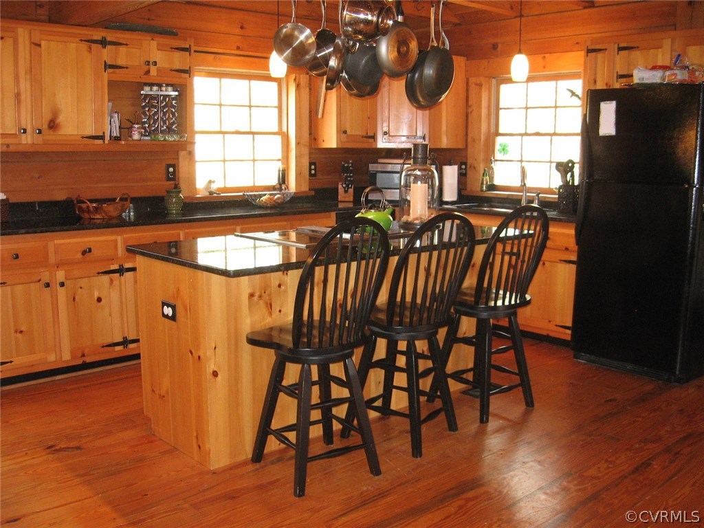 1451 Mill Road Henrico, VA 23231 - Photo 5 of 23 a view of a dining room with furniture window and wooden floor