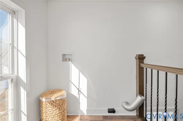 a view of entryway with wooden floor