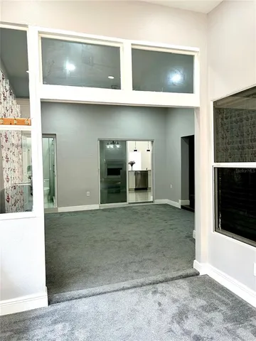 a large bathroom with a double vanity sink a mirror and a bathtub