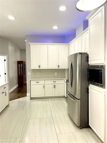 a bathroom with a shower and a toilet