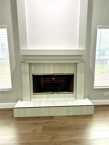 a bathroom with a bathtub sink and vanity
