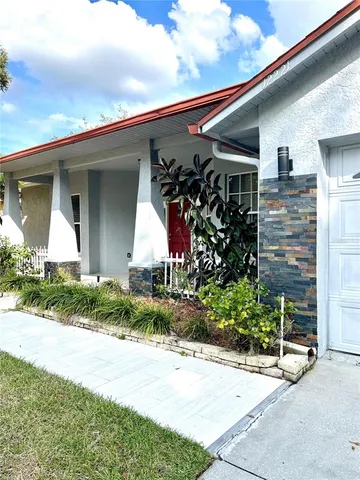 a view of an empty room with large window