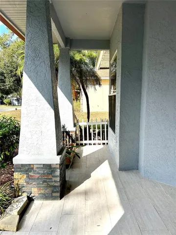 a living room with a fireplace and a table