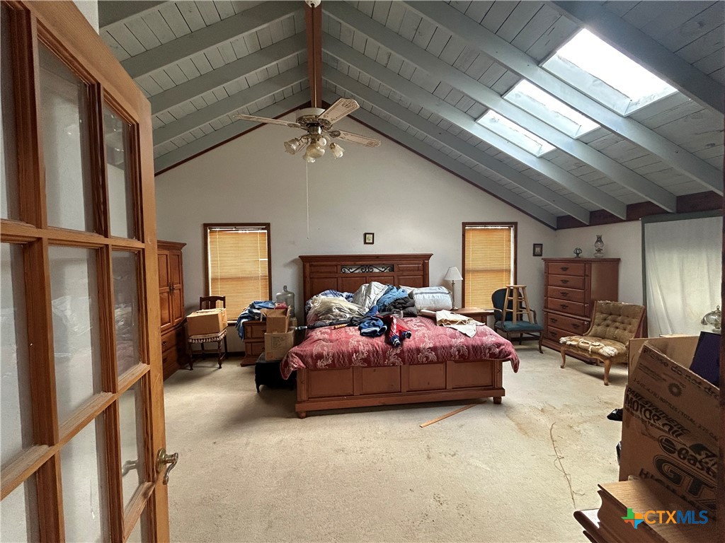 3849 Zion Hill Road Seguin, TX 78155 - Photo 18 of 35 a bed room with bed and window