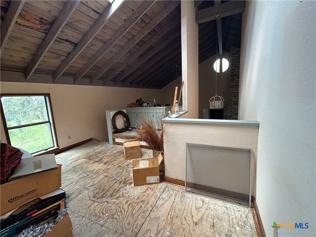 3849 Zion Hill Road Seguin, TX 78155 - Photo 19 of 35 a room with a fireplace and a window