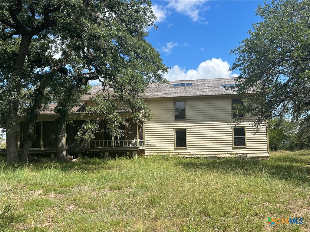 3849 Zion Hill Road Seguin, TX 78155 - Photo 33 of 35 a front view of a house with a yard