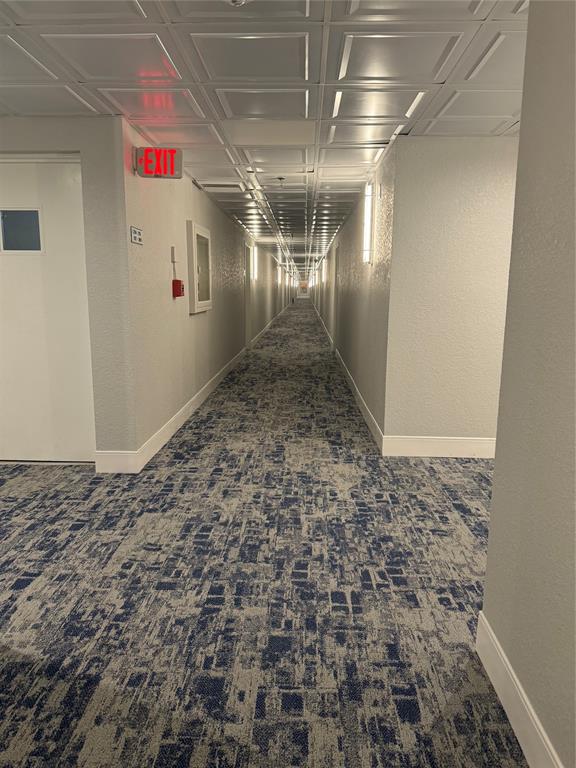 859 Jeffery Street, Unit 214 Boca Raton, FL 33487 - Photo 16 of 32 a view of a hallway with a refrigerator