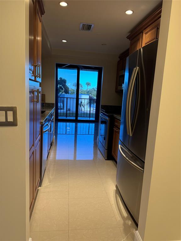 859 Jeffery Street, Unit 214 Boca Raton, FL 33487 - Photo 20 of 32 a view of a living room with furniture