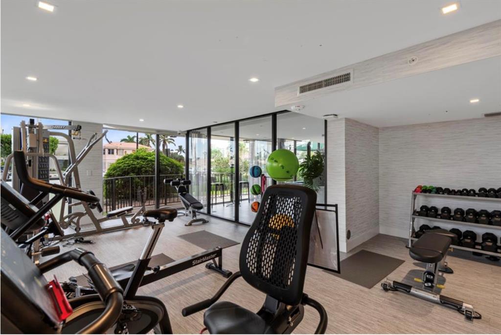 859 Jeffery Street, Unit 214 Boca Raton, FL 33487 - Photo 27 of 32 a view of a room with gym equipment