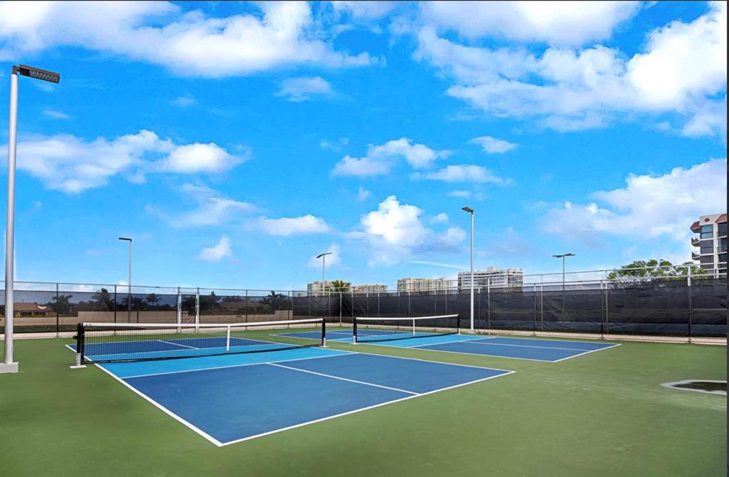 859 Jeffery Street, Unit 214 Boca Raton, FL 33487 - Photo 5 of 32 a view of a tennis court