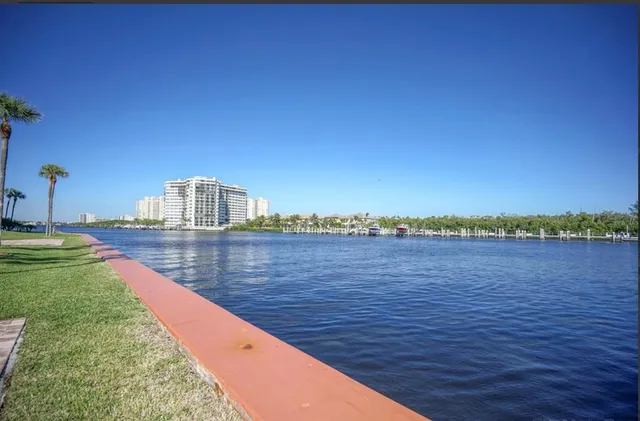 a view of a lake from a balcony