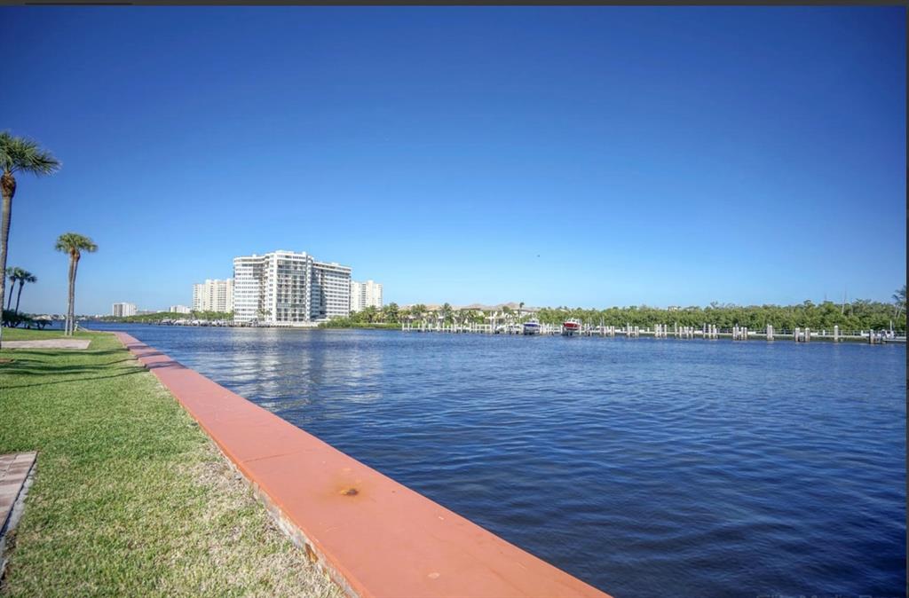 859 Jeffery Street, Unit 214 Boca Raton, FL 33487 - Photo 7 of 32 a view of a lake from a balcony