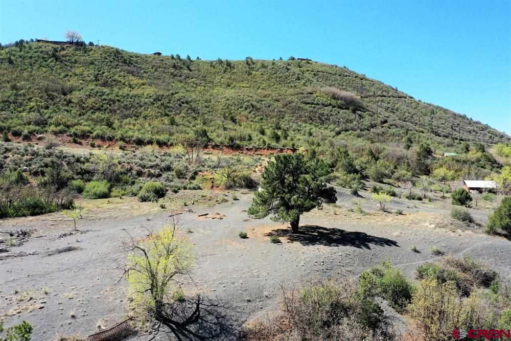 900 Florida Road Durango, CO 81301 - Photo 11 of 15 a view of a beach with a mountain in the background