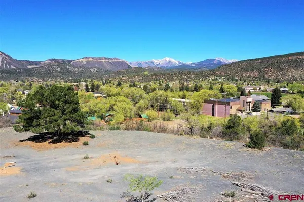 a view of a city with mountain