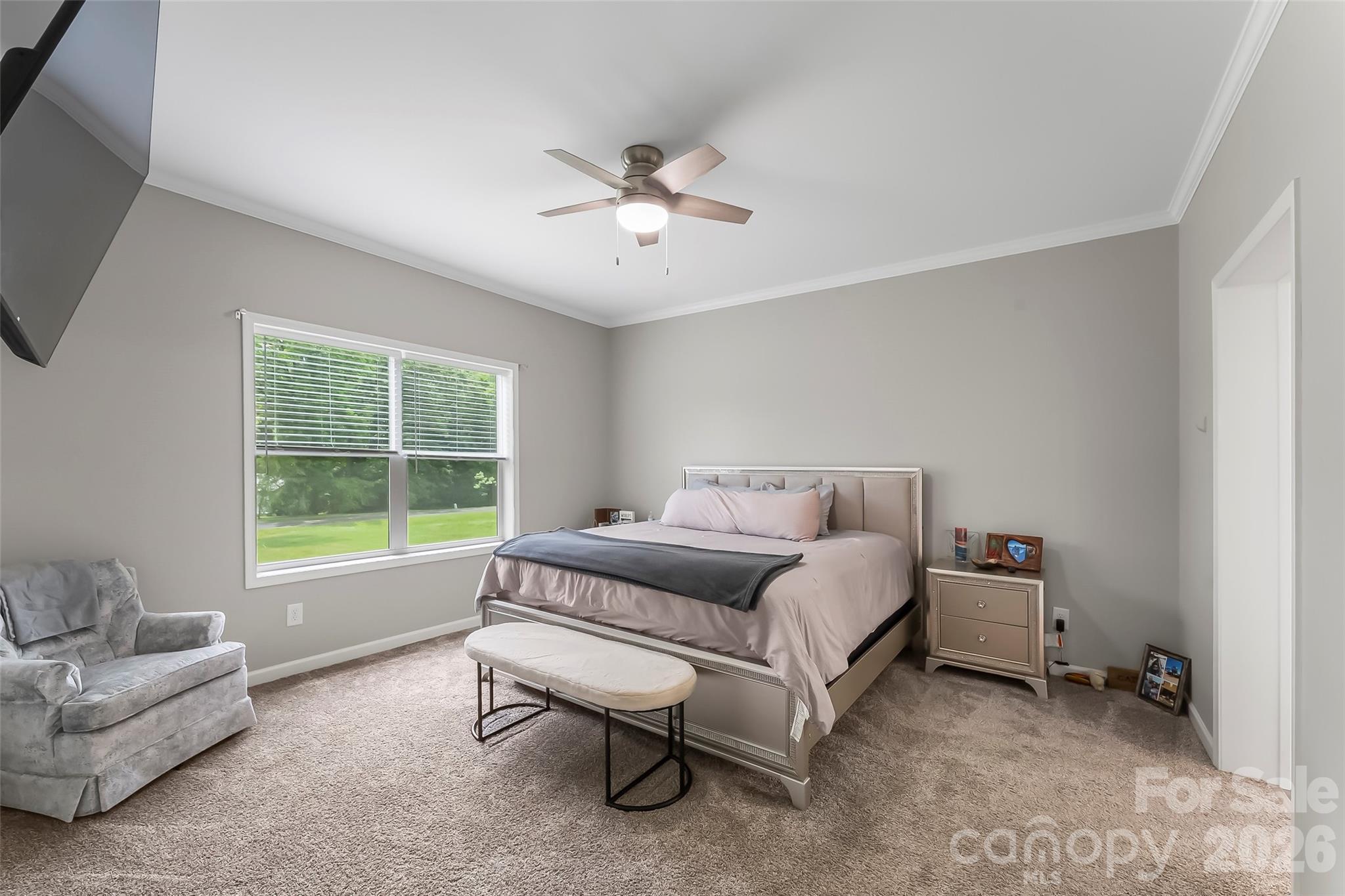 3511 Randleman Road Iron Station, NC 28080 - Photo 14 of 31 a bedroom with a bed and a couch