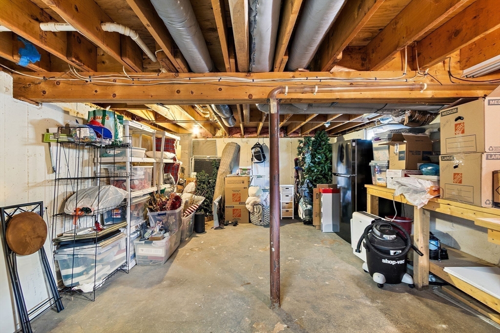 61 Pine Ridge Drive Franklin, MA 02038 - Photo 31 of 41 a view of a storage room with furniture