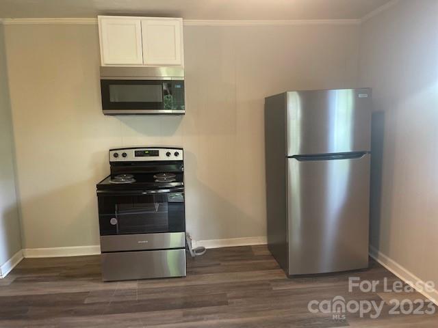 320 Orange Street Charlotte, NC 28205 - Photo 12 of 14 a metallic refrigerator freezer sitting in a kitchen