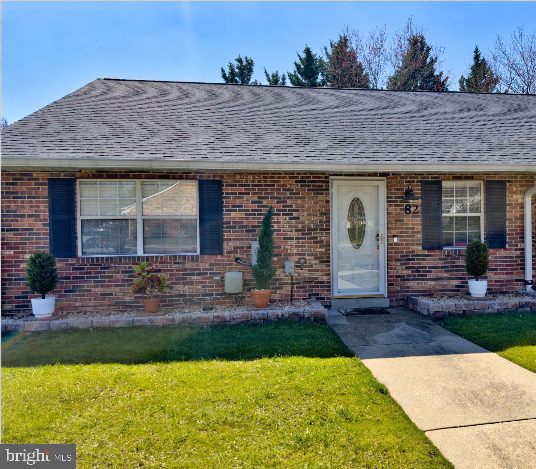 Charming brick home with inviting curb appeal.