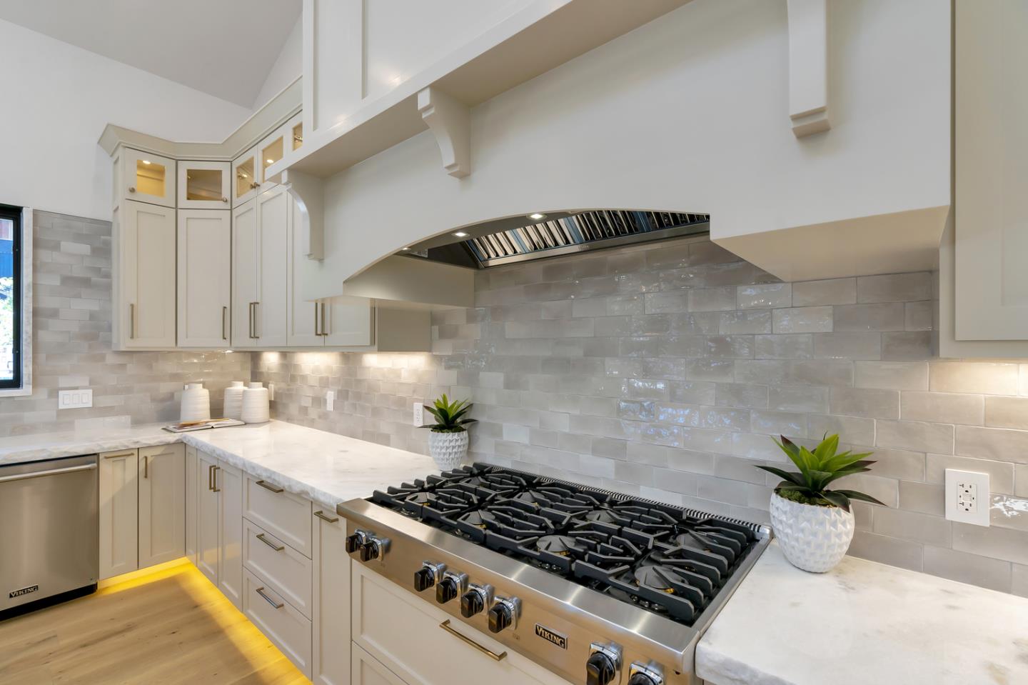 15941 Viewfield Road Monte Sereno, CA 95030 - Photo 16 of 70 a kitchen with a stove and a white cabinets