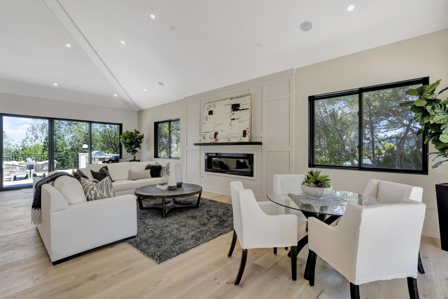 15941 Viewfield Road Monte Sereno, CA 95030 - Photo 18 of 70 a living room with fireplace furniture and a large window