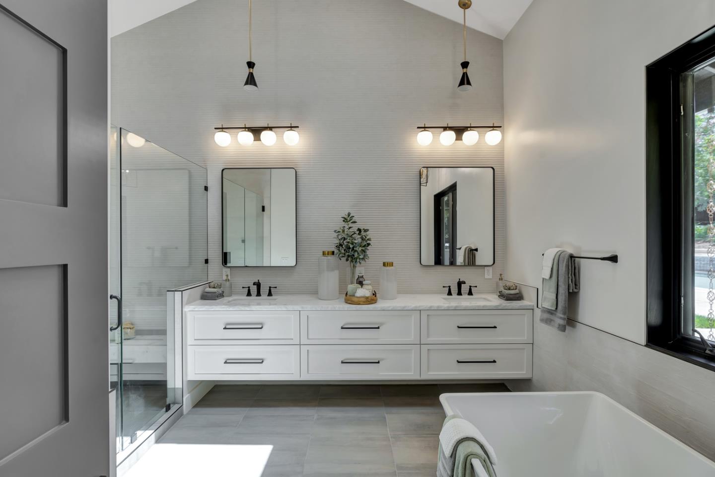 15941 Viewfield Road Monte Sereno, CA 95030 - Photo 27 of 70 a bathroom with a double vanity sink mirror and bathtub