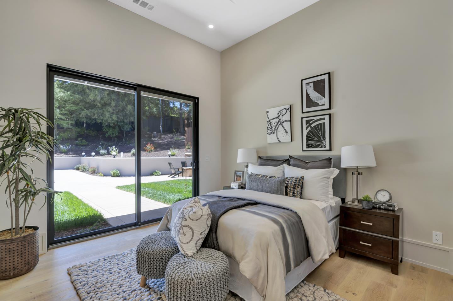 15941 Viewfield Road Monte Sereno, CA 95030 - Photo 30 of 70 a bedroom with a bed and a couch