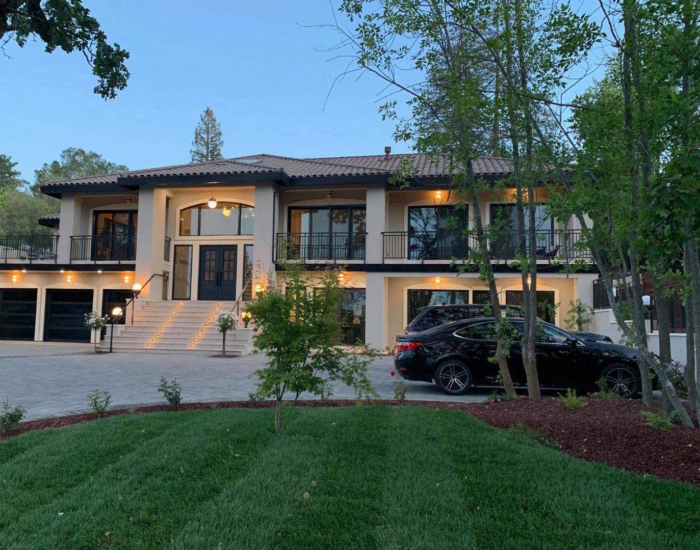 15941 Viewfield Road Monte Sereno, CA 95030 - Photo 3 of 70 a front view of a house with a garden and plants