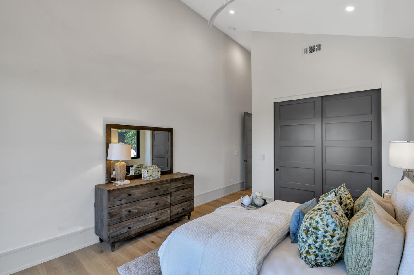 15941 Viewfield Road Monte Sereno, CA 95030 - Photo 32 of 70 a bedroom with furniture and a mirror