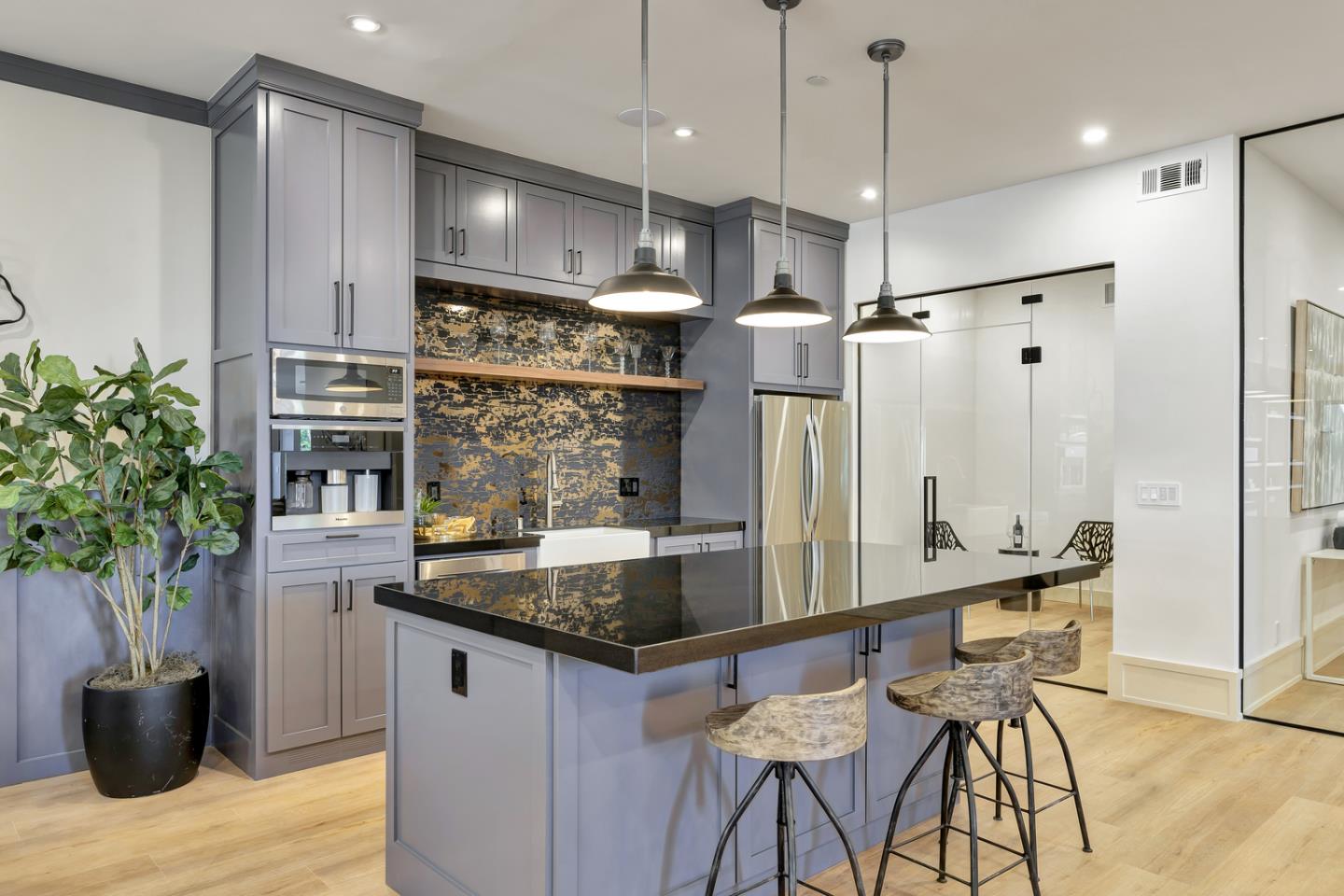 15941 Viewfield Road Monte Sereno, CA 95030 - Photo 47 of 70 a kitchen with kitchen island a counter top space appliances and cabinets