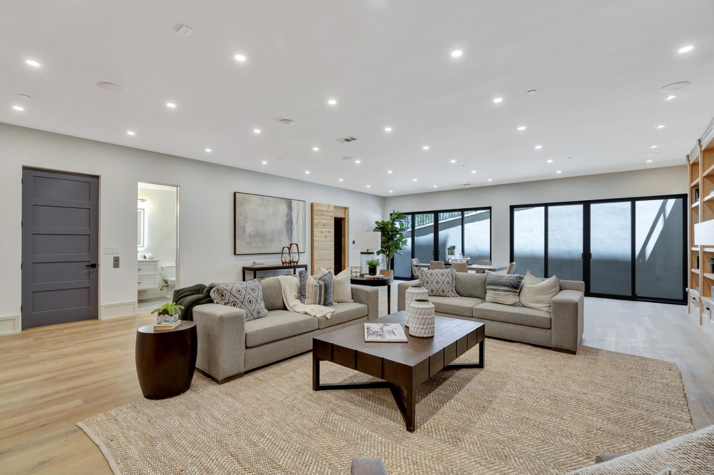 15941 Viewfield Road Monte Sereno, CA 95030 - Photo 49 of 70 a living room with furniture and wooden floor
