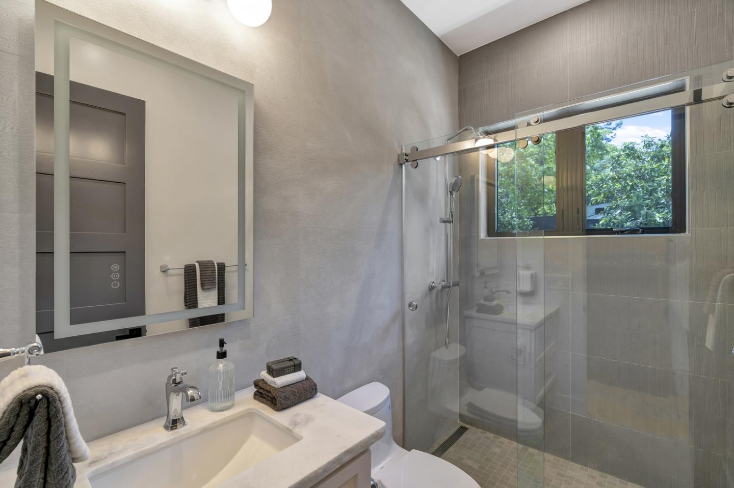 15941 Viewfield Road Monte Sereno, CA 95030 - Photo 56 of 70 a bathroom with a sink toilet and shower
