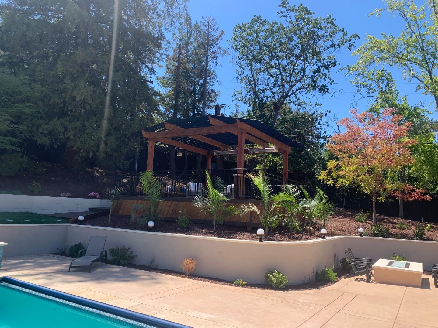 15941 Viewfield Road Monte Sereno, CA 95030 - Photo 61 of 70 a view of a house with yard and sitting area