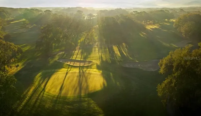 a view of a swimming pool with a lake view