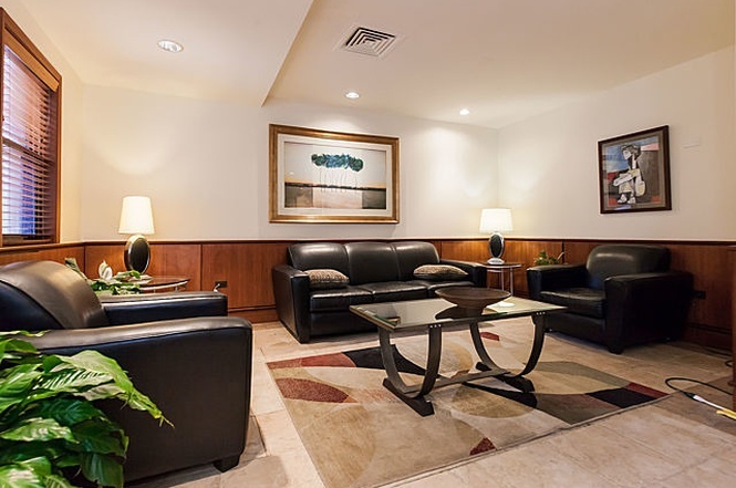 6030 North Sheridan Road, Unit 602 Chicago, IL 60660 - Photo 11 of 14 a living room with furniture and painting on the wall