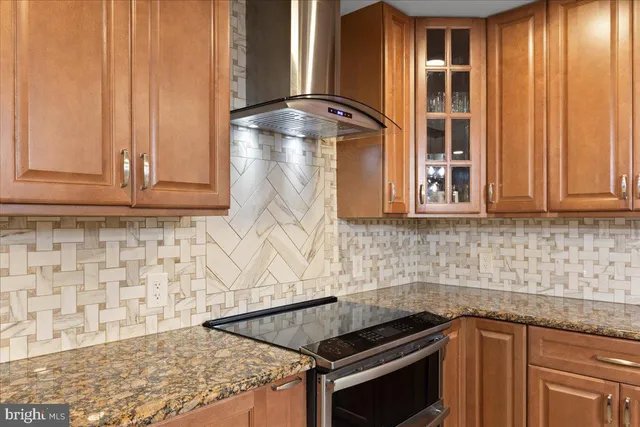 a bedroom with a bed furniture and a flat screen tv