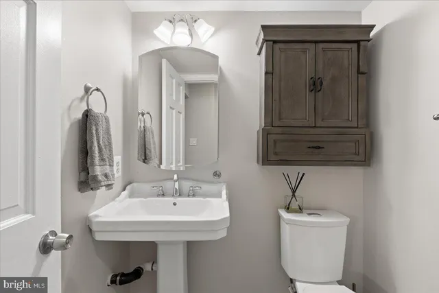 a bedroom with furniture and window