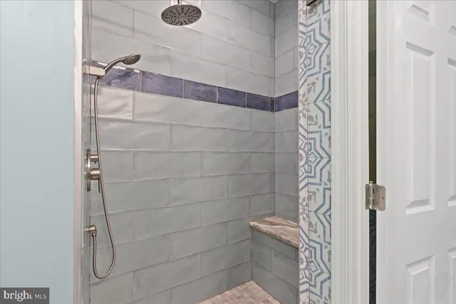 a view of a room with gym equipment and window