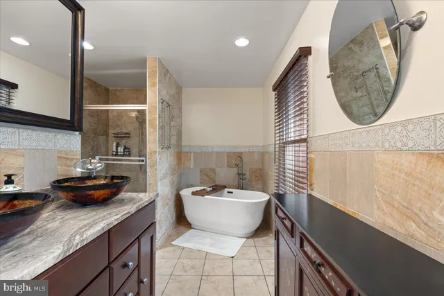 a view of a workspace with furniture and wooden floor