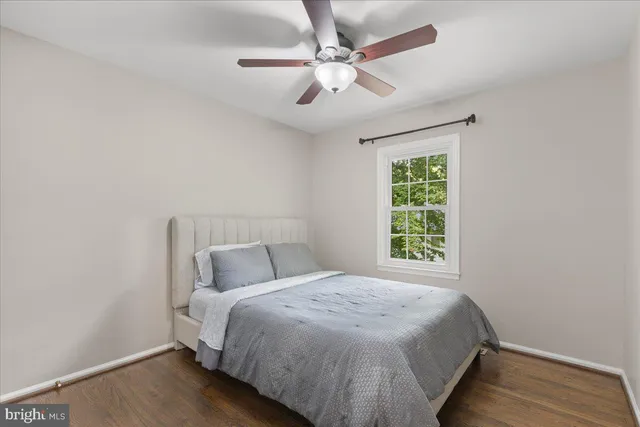 a view of house with a yard and garden