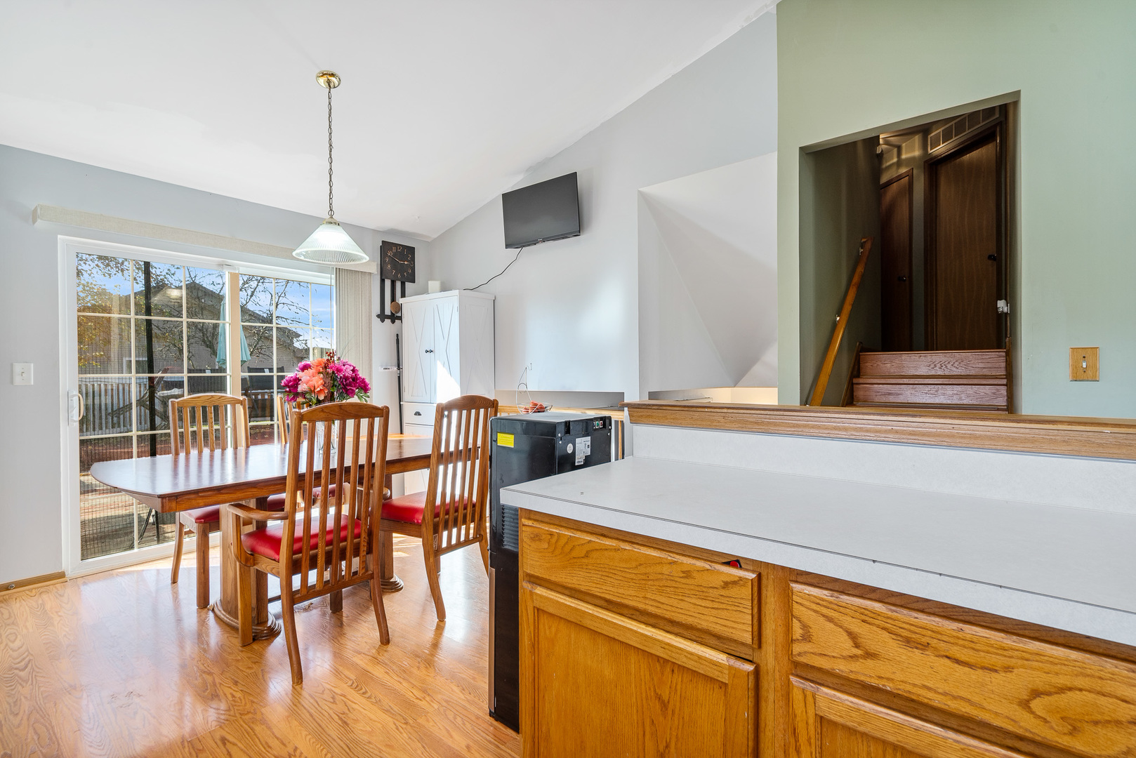5221 West Mulberry Lane Monee, IL 60449 - Photo 5 of 32 a dinning table with chairs and wooden floor