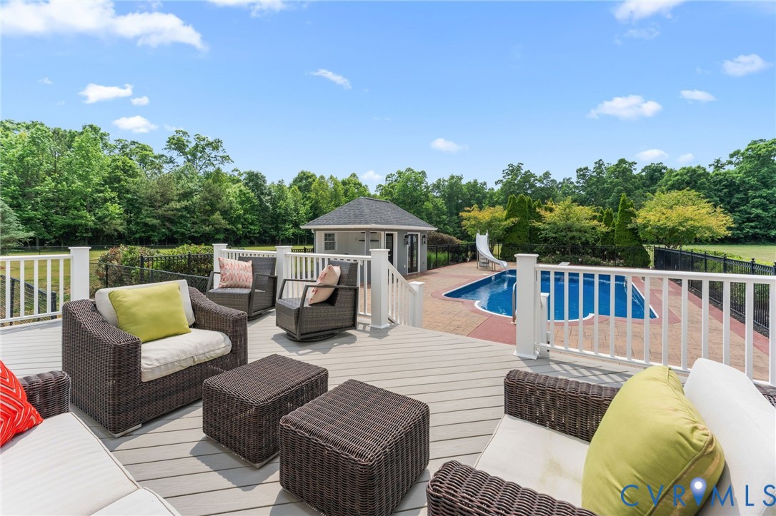 13446 Bradley Bridge Road Chester, VA 23831 - Photo 65 of 98 Composite decking and rails leading into dog run.