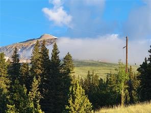 22 Ron's Road Alma, CO 80420 - Photo 3 of 27 a view of a large body of water with a building in the background