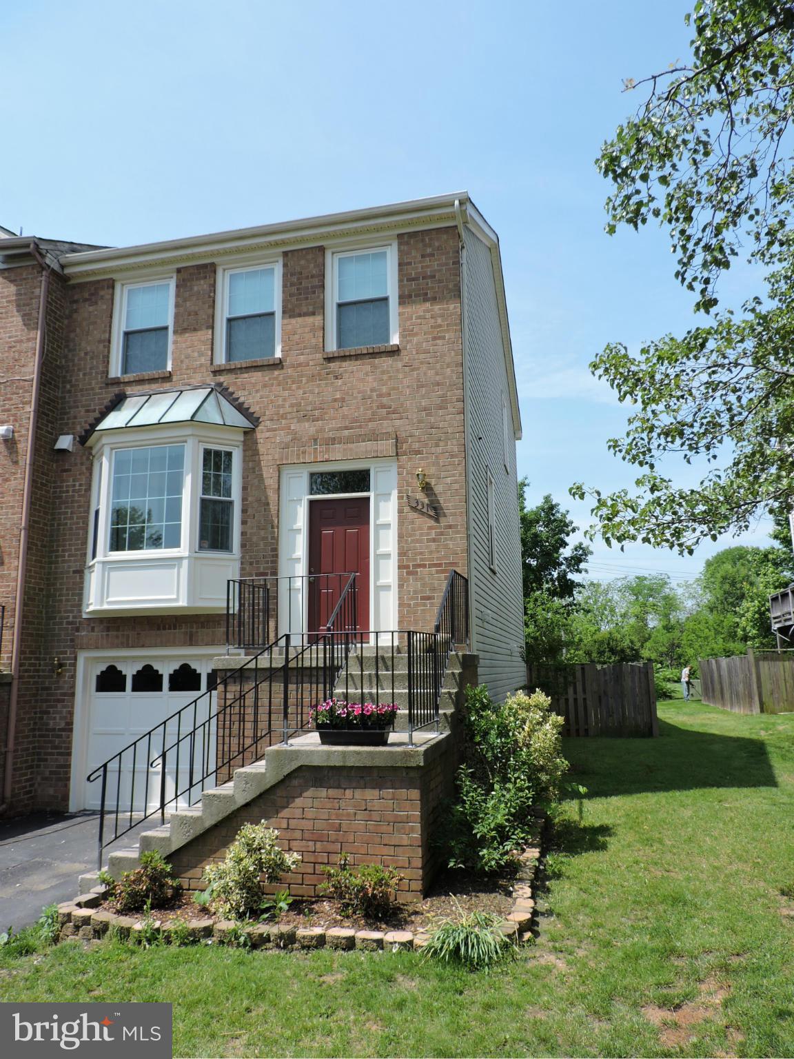 331 Davis Avenue Southwest Leesburg, VA 20175 - Photo 1 of 29 a front view of a house with a yard
